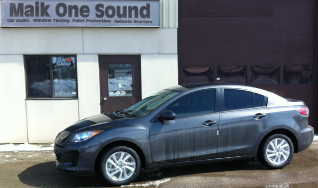 2013 Mazda3 Sedan with professional window tint in North Bay